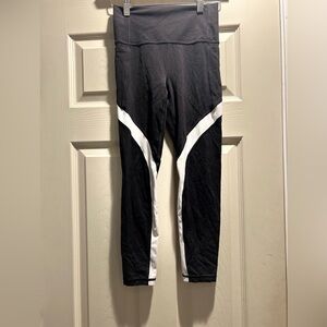 Athleta Salutation Stash 7/8 Black Leggings with White Stripes